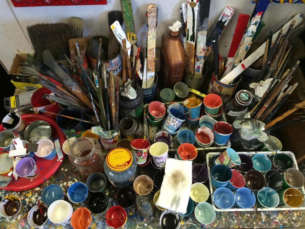 Color selection at Mystic Signs is an actual palette and jars of paint.